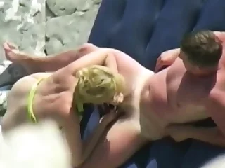 my mom and her paramour on a private beach