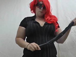 Hottie babe dressed in her red wig ready to drill her slit with a dildo